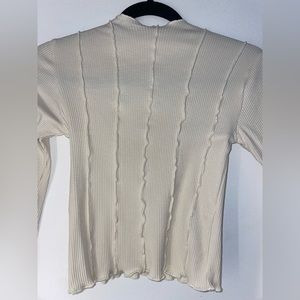 Cream long sleeve shirt